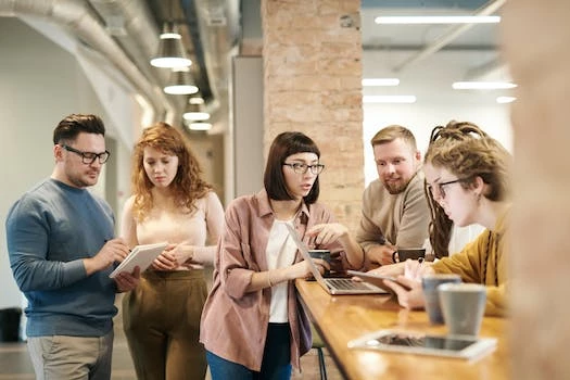 standing meeting image by Pexels