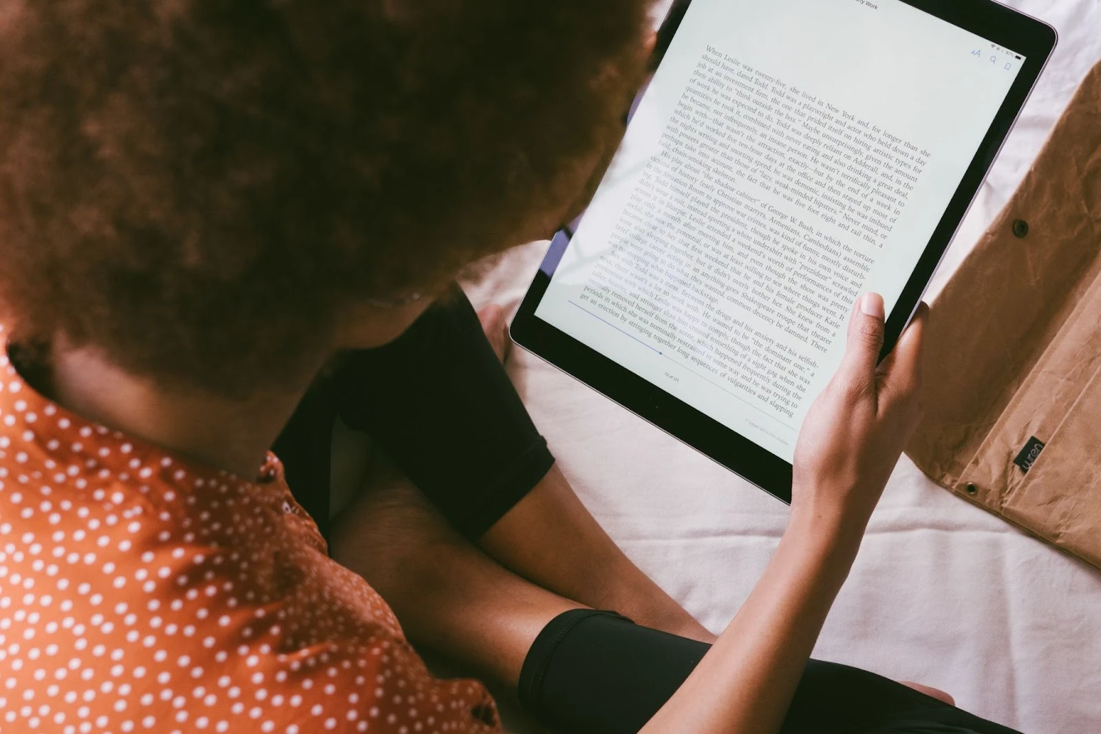 A person reading an ebook