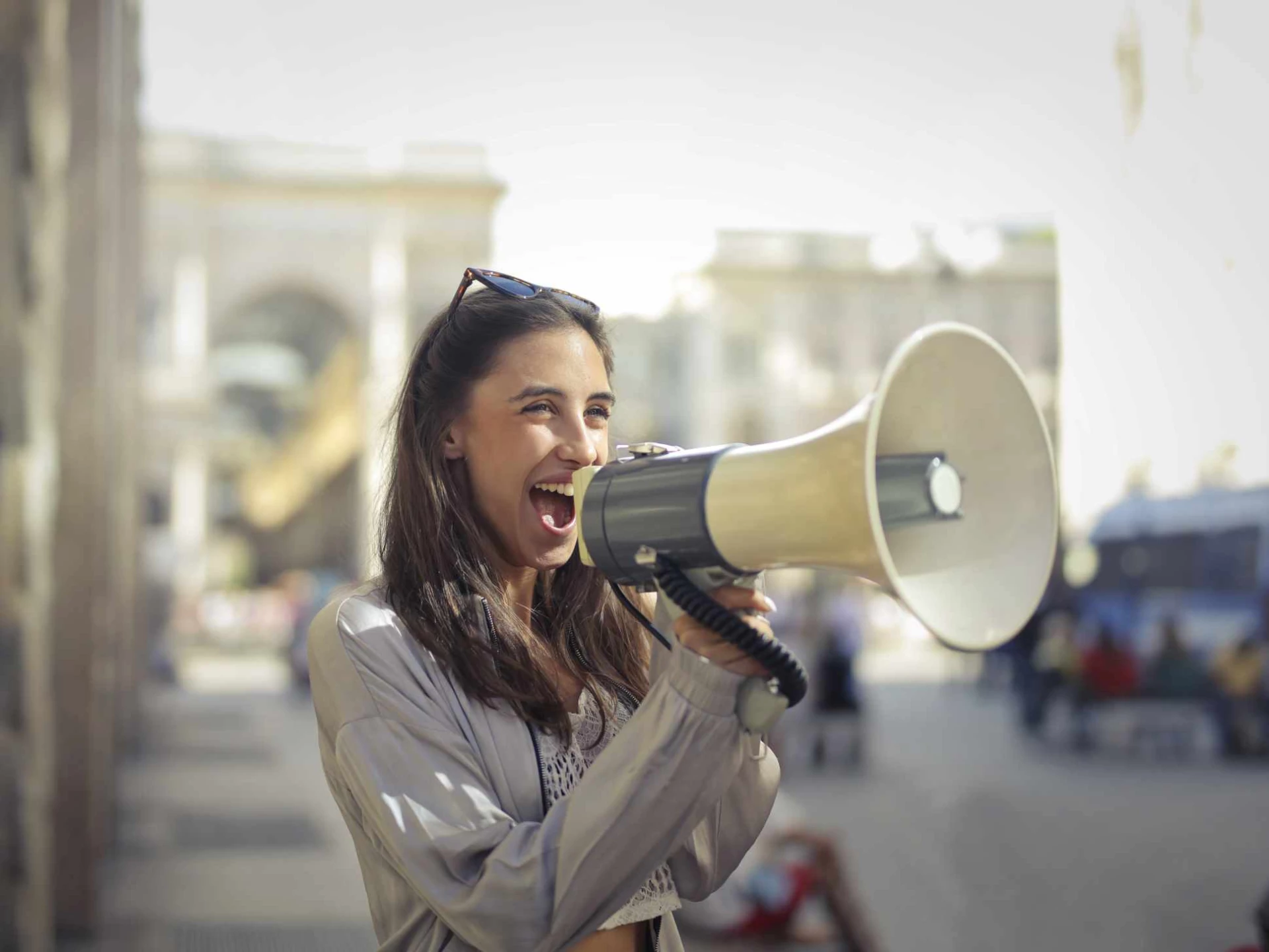 Example of guerilla marketing: woman using megaphone