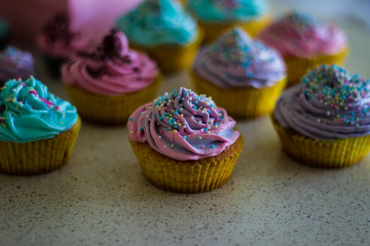 Image depicting an assortment of cupcakes