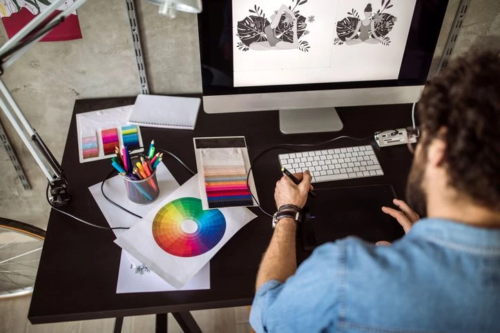 graphic designer working on his small business